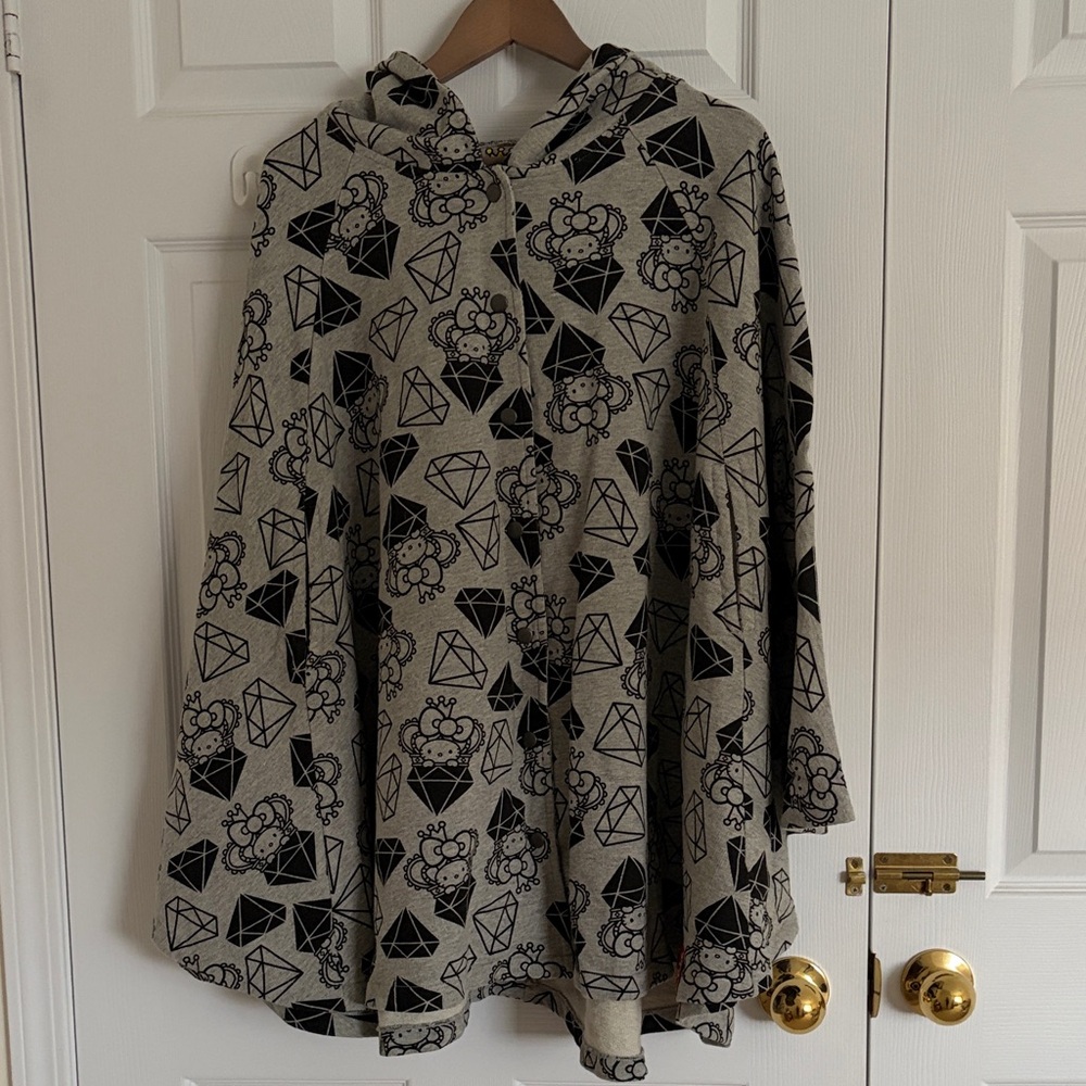 Hello Kitty Gray Poncho with Black Geometric Design